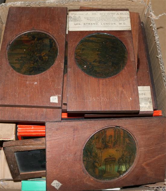 Collection of coloured magic lantern slides, pens, etc